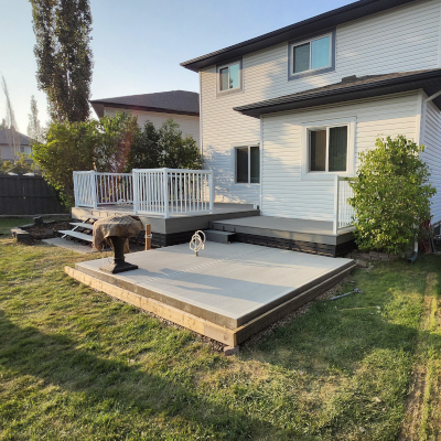 Deck with white fascia, white handrail, and black metal pickets